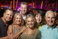 Portrait Of Senior Friends On Evening Out Together Royalty Free Stock Photo