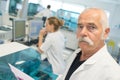 Portrait senior male doctor in laboratory Royalty Free Stock Photo