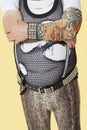 Midsection of senior male punk musician playing guitar Royalty Free Stock Photo