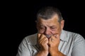 Portrait of senior man desperately thinking Royalty Free Stock Photo