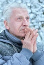 Close up portrait of senior man praying Royalty Free Stock Photo