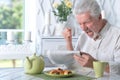 Portrait of an senior man reading newspaper Royalty Free Stock Photo