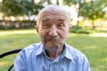Portrait of senior man with white mustache looking at camera and making faces. Man looking goofy and funny with a silly cross-eyed Royalty Free Stock Photo