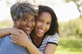 Portrait Of Senior Mother With Adult Daughter In Park Royalty Free Stock Photo