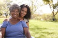 Portrait Of Senior Mother With Adult Daughter In Park Royalty Free Stock Photo