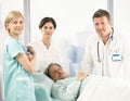 Portrait of senior patient with hospital crew Royalty Free Stock Photo