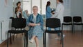 Portrait of senior patient sitting in waiting room area Royalty Free Stock Photo