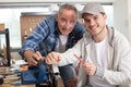 portrait senior tradesman with junior apprentice Royalty Free Stock Photo