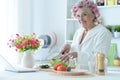 Portrait of senior woman in hair rollers Royalty Free Stock Photo