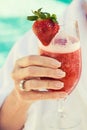 Portrait of Senior woman holding strawberry cocktail Royalty Free Stock Photo