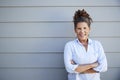 Portrait Of Senior Woman Standing Outside Grey Clapboard House Royalty Free Stock Photo