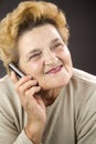 Portrait of senior woman takling on cellphone