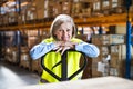 Senior woman worker or supervisor in a warehouse. Royalty Free Stock Photo