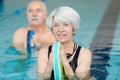 portrait seniors doing aqua aerobics Royalty Free Stock Photo