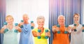 Portrait of seniors exercising with weights Royalty Free Stock Photo