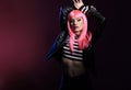 Portrait of sensual beauty model with pink hair wig and rocker jacket Royalty Free Stock Photo