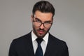 Portrait of sensual businessman looking over glasses Royalty Free Stock Photo