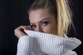 Portrait of sensual positive beautiful blond woman in sweater Royalty Free Stock Photo