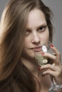 Portrait of sensual woman with long beautiful hair drinking glass of white wine Royalty Free Stock Photo