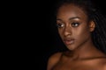 portrait of sensual young african american woman with water drops on face looking away Royalty Free Stock Photo