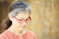 Portrait of serene mature woman in garden