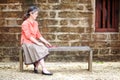 Portrait of serene mature woman in garden