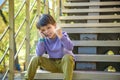 Portrait of a serious angry teenage boy talking on smartphone. Outdoor. Technology, winning, people, children concept Royalty Free Stock Photo