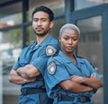 Portrait, serious and arms crossed with the police force standing outdoor in the city for law enforcement. Safety Royalty Free Stock Photo