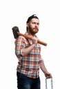 Portrait of serious bearded man in cap and checked shirt, holds hammer and chain on white background Royalty Free Stock Photo