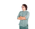 Portrait of serious brunette businessman, long curly hair style, keeps arms crossed looking confident and focused aside, isolated