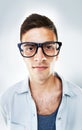 Portrait, serious and business man in glasses in studio isolated on a white background. Face of confident nerd, geek and Royalty Free Stock Photo