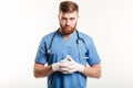 Portrait of a serious concentrated male medical doctor or nurse