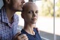 Portrait of serious determined young woman fighting against cancer