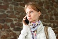 Portrait of serious focused girl speaking by phone Royalty Free Stock Photo