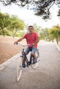 Portrait of serious mature man riding bicycle Royalty Free Stock Photo