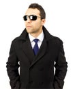 Portrait of a serious standing man with sunglasses