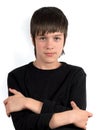 Portrait of serious teenager with arms crossed at chest