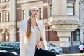 Portrait of serious young business woman talking on mobile phone Royalty Free Stock Photo