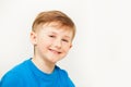 Portrait of seven years old boy in blue t-shirt Royalty Free Stock Photo