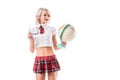 portrait of sexy blond woman in schoolgirl uniform holding globe and eyeglasses