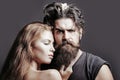 Portrait of sexy couple embracing. Bearded handsome man and female slim flexible body of young pretty sexy woman or girl Royalty Free Stock Photo