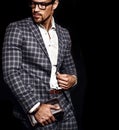 Handsome fashion male model man dressed in elegant suit Royalty Free Stock Photo