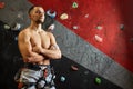 Portrait of cheerful rock climber in indoor climbing gym Royalty Free Stock Photo