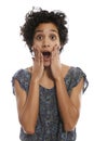 Portrait of shocked hispanic woman with mouth open Royalty Free Stock Photo