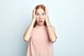 Portrait of shocked scared young woman having panic expression Royalty Free Stock Photo