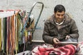 A Portrait of Shoe Repairer Man Beside Street