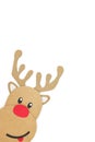 Portrait shot of cute and happy baby reindeer cardboard cutout with red nose peeking on a white background.