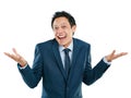 Portrait, shrug and excited with a business asian man in studio isolated on a white background for promotion. Comic