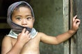 Portrait of shy Filipino boy with shining eyes