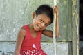 Portrait of shy laughing Filipino boy